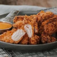 Twisted Tenders · Chicken tenders marinated in buttermilk for 24 hours and. breaded in our Twisted seasoned fl...