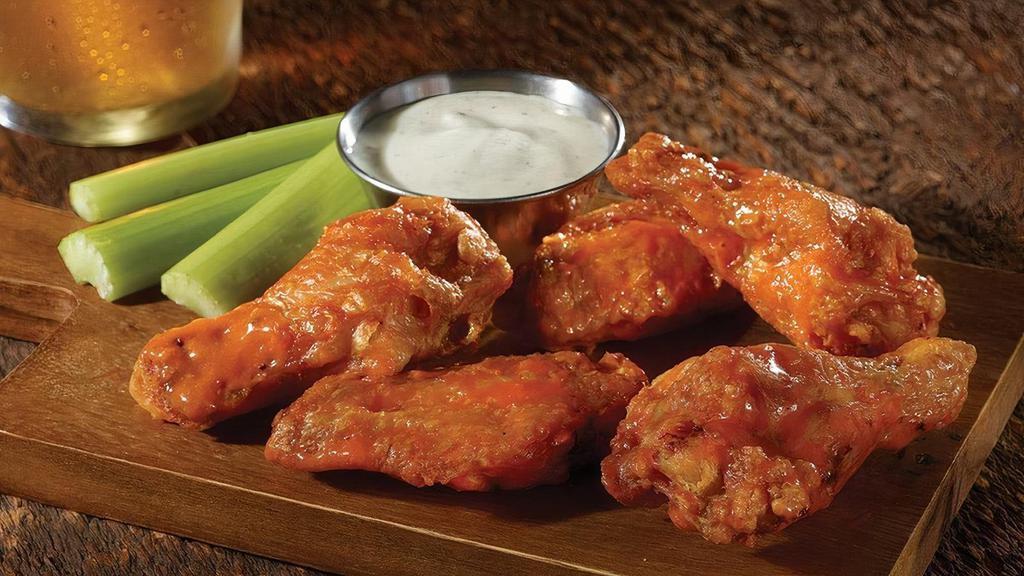 *Gs* Classic Chicken Wings Short · Traditional bone-in, twice cooked chicken wings hand tossed in one of our signature sauces or dry rubs. Served with celery sticks and your choice of. house-made ranch or bleu cheese dressing.