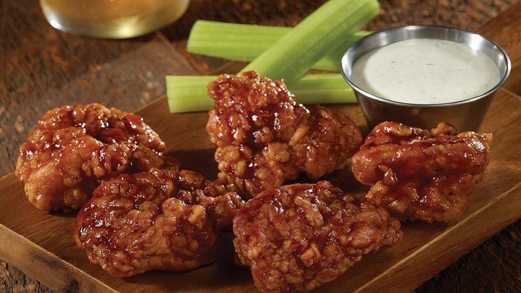 Boneless Chicken Wings Short · Breaded all-white meat boneless chicken wings hand tossed in one of our signature sauces or dry rubs.