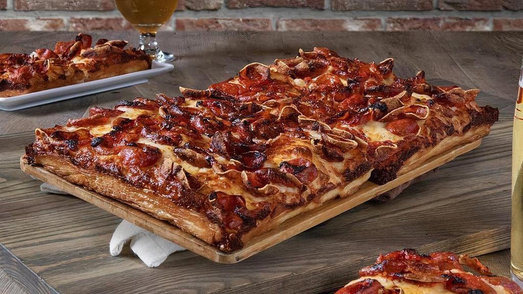 The Pepperoni · Covered in brick cheese, pizza sauce, and cup & char pepperoni.