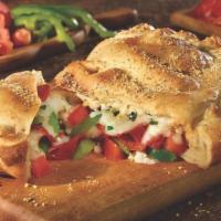 Craft Your Own Calzone · A blend of mozzarella, ricotta. Choose your favorite fresh toppings.