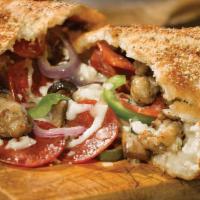 Chicago 7™ Calzone · Pepperoni, Italian sausage, red onions, black olives, green peppers, sliced mushrooms, mozza...