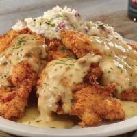 Chicken Fried Chicken · Hand-breaded chicken cutlet dipped in buttermilk and seasoned flour, served crispy over mash...