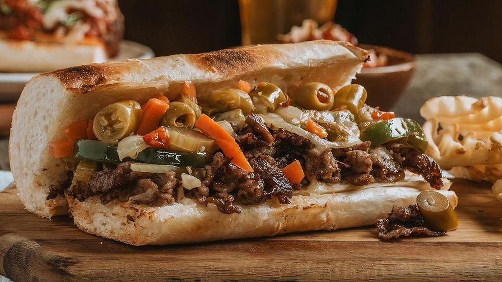Chicago Cheesesteak · Certified Angus beef, sautéed peppers & onions, pepperjack & hot giardiniera.