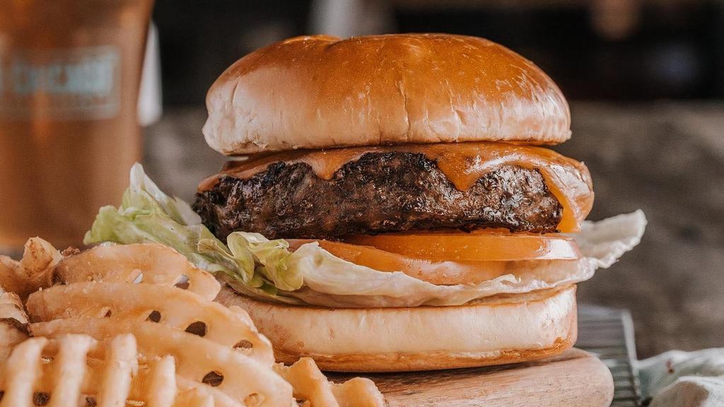 *Gs* Classic Cheddar Burger* · Our steak burger loaded with melted cheddar cheese.  Go bunless or add a Smart Flour Foods Gluten Free bun for no additional charge. .  Served with lettuce, tomato, mayo & deli-style pickles and choice of side.
