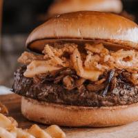 Crafted Beer Burger* · USDA Choice ground chuck burger grilled with a light lager & smothered in caramelized onions...
