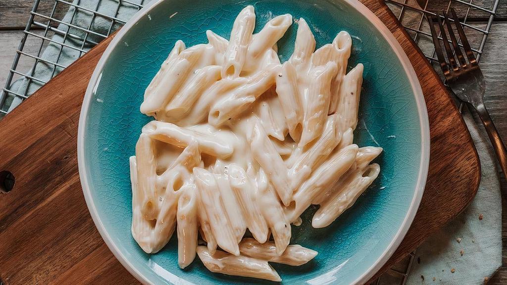 Penne Alfredo · Served with your choice of one side.