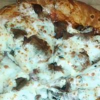 Lamb Pizza · Special sauce, black olives, red onions, feta cheese and blend of cheese.