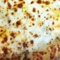 White Pizza · Provolone, mozzarella, cheddar cheese, garlic sauce.