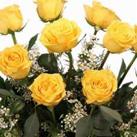 Dozen Yellow Roses Flower Arrangement · These roses will light up any room! Our Dozen Yellow Roses arrangement is bursting with ligh...