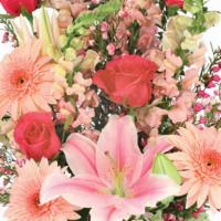 Unconditionally Bouquet · Show your unconditional love with this stunning bouquet! With pink lilies, hot pink roses, p...