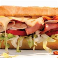Cold Club · Smoked ham, oven-roasted turkey breast, thick-cut smoked bacon, Swiss, lettuce, Roma tomatoe...