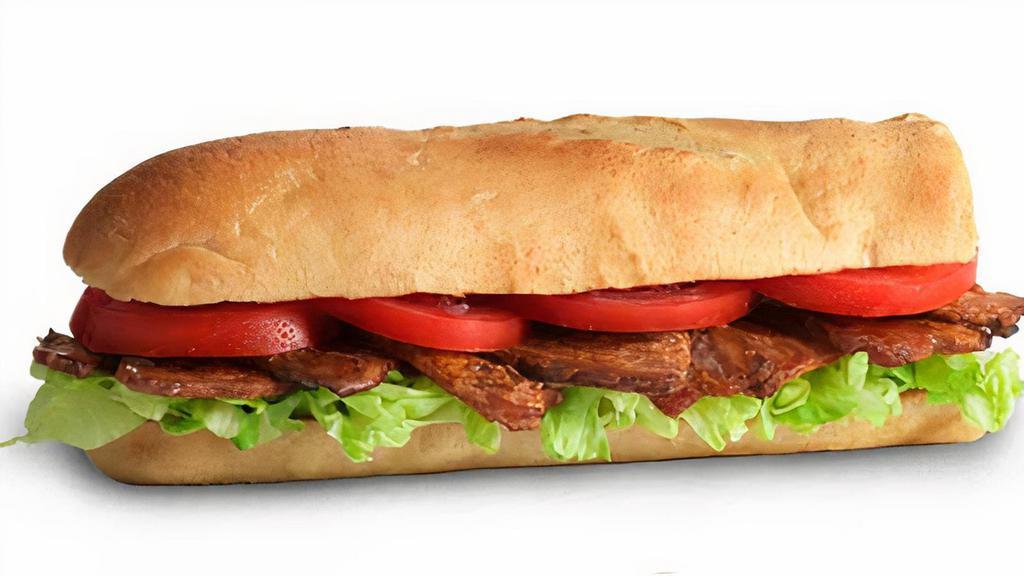 Blt · Thick-cut smoked bacon, lettuce, Roma tomatoes, mayo.