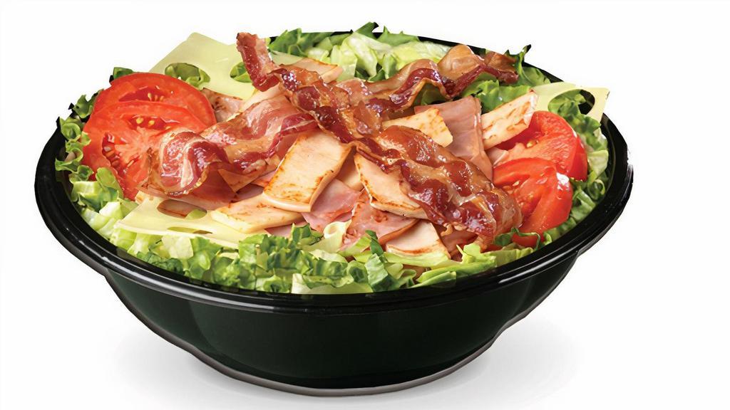 Cold Club Salad · Lettuce, Roma tomatoes, Smoked ham, oven-roasted turkey breast, thick-cut smoked bacon, Swiss.