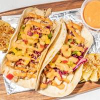 Vegan Chicken Tacos · Vegan chicken, organic mango pico, lime coleslaw.