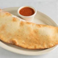 Tuscan (Calzone) · Pepperoni, black olives, red onion, diced tomatoes, and pepperoncini.
