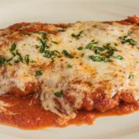 Chicken Parmesan · Italian breaded fried chicken baked with ricotta, fresh basil, Amici marinara, and provolone...