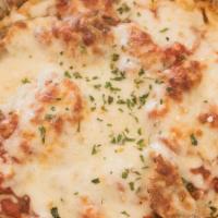 Baked Ziti Pie · Penne pasta, ricotta, mozzarella cheese and sauce.