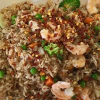 Shrimp Rice · Fried rice with shrimp, peas and carrots.