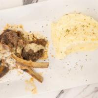 Lamb Chops · Seasoned with African herbs and served with bell peppers and onions

Side Options: mashed po...