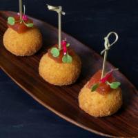 Goat Cheese Croquette · Tomato jam, and micro salad