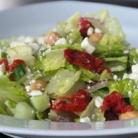 Mediterranean · Cucumber, olives, garbanzos, feta cheese, red onions, sundried tomatoes over romaine lettuce...