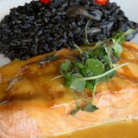 Salmon · Passion fruit sauce, served with Squid ink risotto

Consuming raw or undercooked meats, poul...