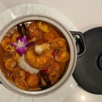 Seafood Casserole · Lobster, shrimps, clams, mussels, calamari, Jasmine rice in saffron lobster bisque

Consumin...