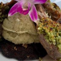 Rack Of Lamb · With a mint chimichurri crust served with green
mashed potatoes over grilled Portobello

Con...