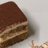 Tiramisu · Vanilla sponge layered with espresso, mascarpone cheese, rum and cocoa