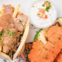 Signature Gyro · Double Protein loaded with fries& tzatziki sauce