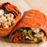 Southwest Turkey Wrap · Sundried tomato wrap, natural turkey breast, bean mix, and spicy chipotle sauce.