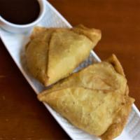 Samosa · Pastry with mild spices and green spices.