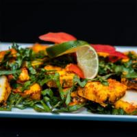 Paneer Tikka · Cheese cubes cooked in clay oven.
