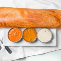 Masala Dosa · Rice crepe with vegetable stuffing.