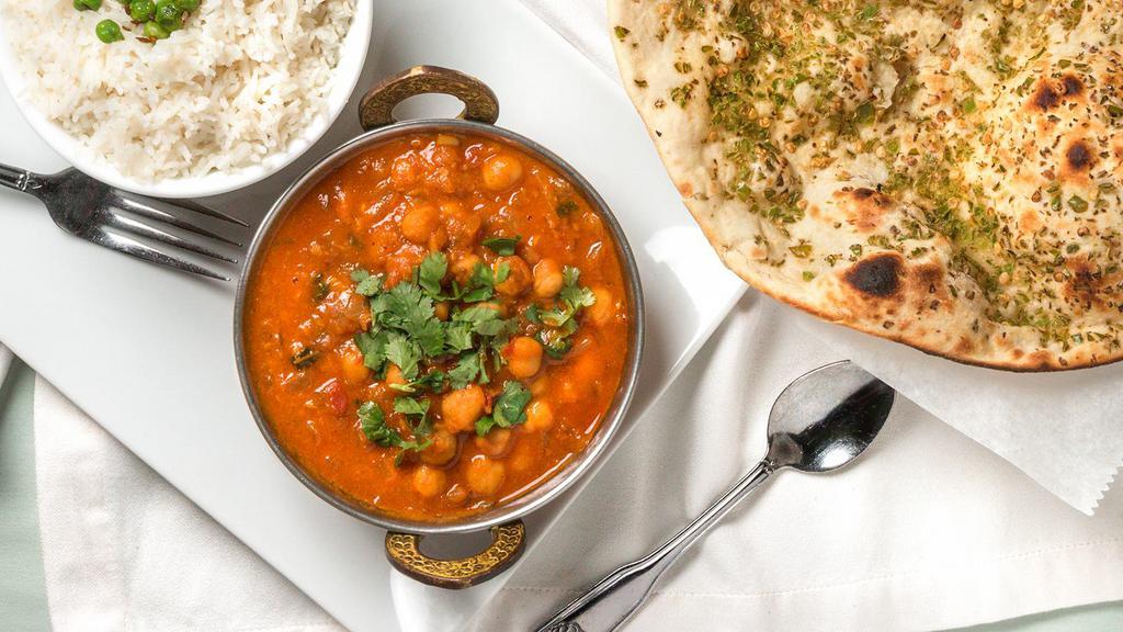 Chana Masala · Garbanzo beans cooked with tomato and onion.