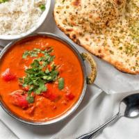 Chicken Tikka Masala · Boneless chicken pieces boiled in tandoor and cooked in tomato sauce.