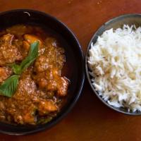 Chicken Vindaloo · Chicken braised in a hot and tangy sauce with potatoes.