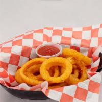 Onion Rings · Hand battered onion rings with ranch dressing.