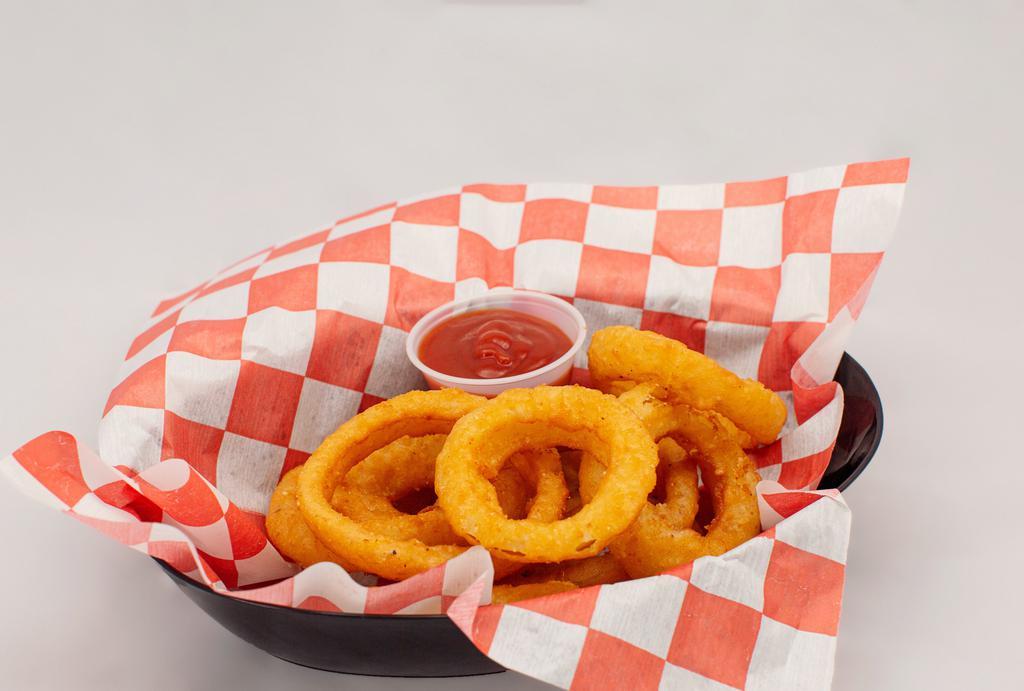 Onion Rings · Hand battered onion rings with ranch dressing.