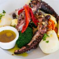 Polvo Grelhado Ou Estufado · Octopus grilled or stewed in Tomato Sauce, served with steamed Potatoes and Vegetables