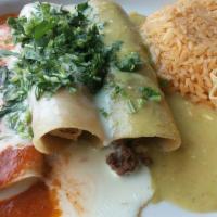 Enchiladas Mexicanas · Three enchiladas, one chicken, one beef and one cheese topped with cheese sauce, red sauce a...