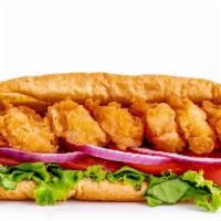 Shrimp Po’Boy · Fried or grilled shrimp served on a hearth baked hoagie bun with lettuce, tomato, onion and ...