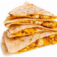 Quesadilla · Blend of cheeses, tomatoes and spicy jalapeño sauce served with fresh tortilla chips, sour c...
