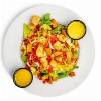 House Salad · An entrée size salad with romaine mix topped with diced tomato, cheese and croutons (bacon u...