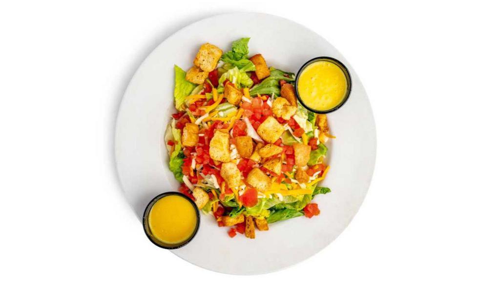 House Salad · An entrée size salad with romaine mix topped with diced tomato, cheese and croutons (bacon upon request).