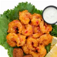 Buffalo Shrimp Basket · Grilled or hand-breaded fried shrimp tossed in any of our signature sauces served with hush ...