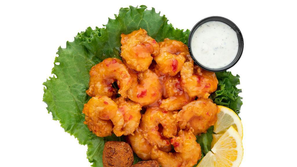 Buffalo Shrimp Basket · Grilled or hand-breaded fried shrimp tossed in any of our signature sauces served with hush puppies and your choice of ranch or blue cheese dressing.