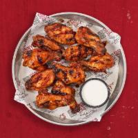 Smoked Wings · Served with Ranch dressing or Blue Cheese.