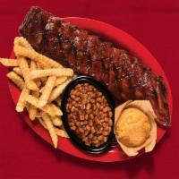 Baby Back Ribs · Served with BBQ beans, coleslaw and garlic bread.